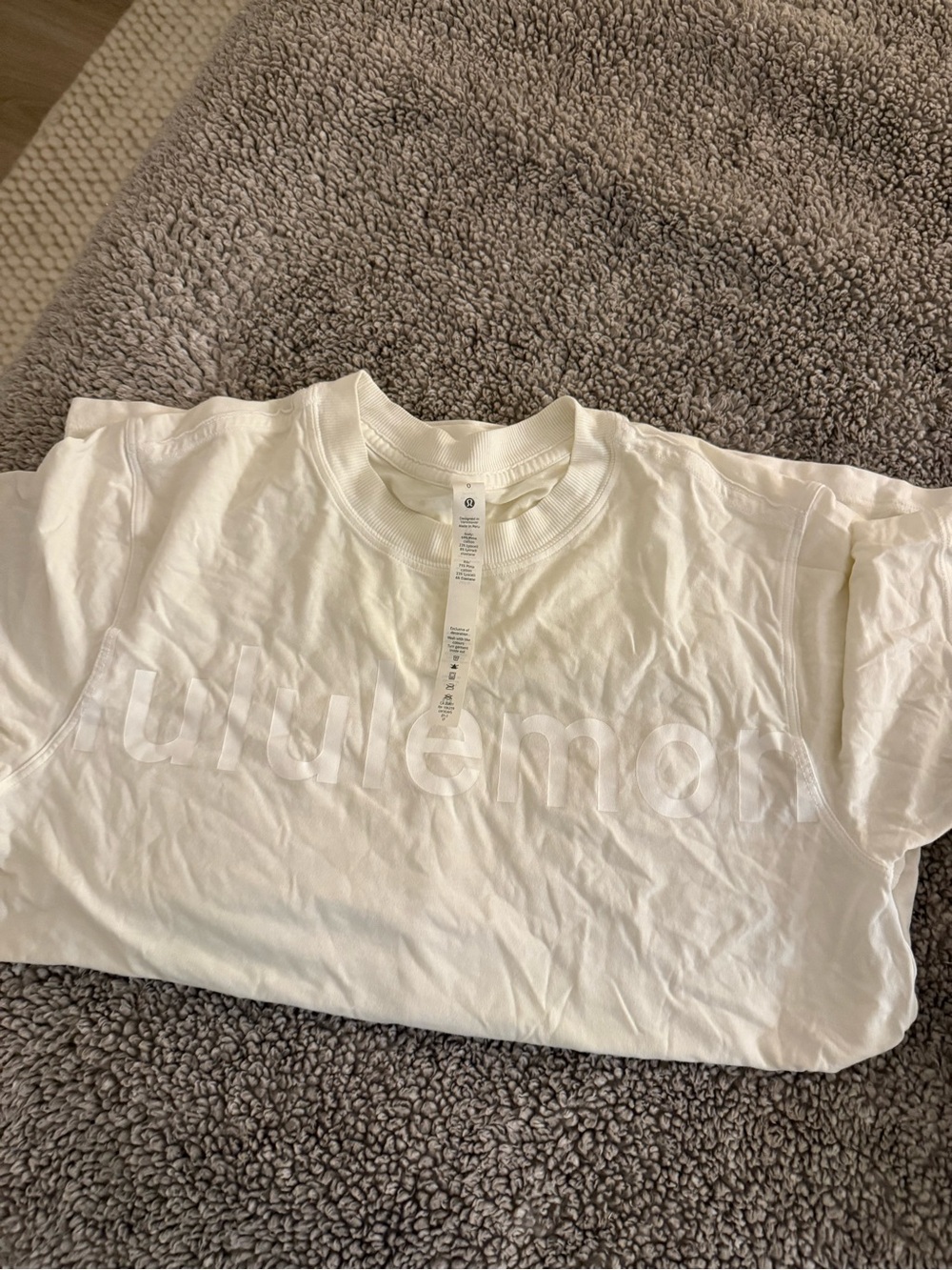 lululemon athletica White Short Sleeve Tee with Subtle Logo - Picture 1 of 3